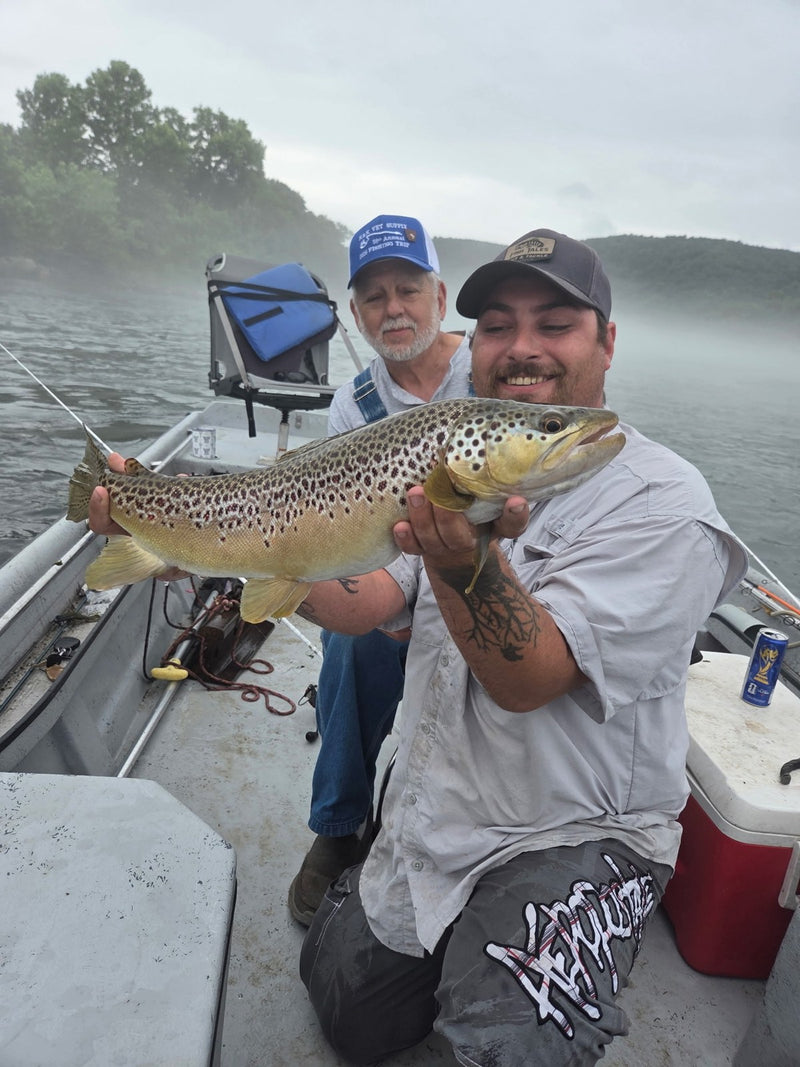 Dale Johnson, 2026 Company Tournament winner ($6,000) in Arkansas, with his brown trout on a 1/8 oz Olive/Orange Zig Jig