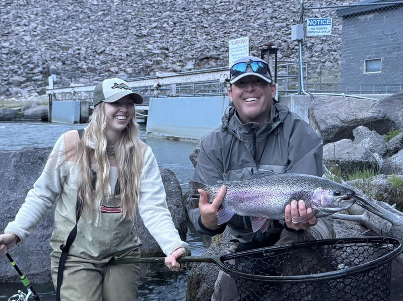 The Rogers duo with a rainbow trout from Box Canyon, Island Park, Idaho, caught on a Zig Jig