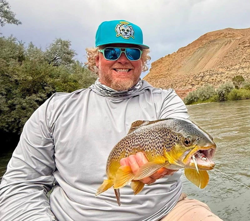The Vanilla Gorilla with a Montana brown trout caught on a Zig Jig