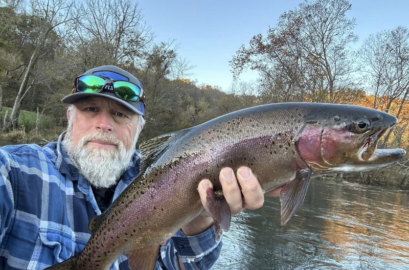 Charles with a Clinch River rainbow trout from Tennessee, caught on a Zig Jig and released