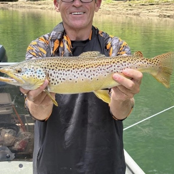 Gary Clark with a Tennessee brown trout caught on a Zig Jig