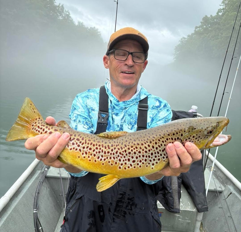 Gary Clark with a Tennessee brown trout caught on a Zig Jig