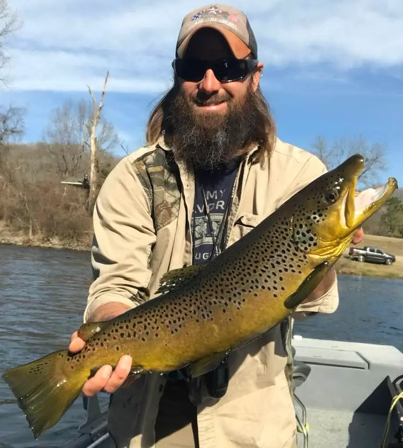 Angler holding a large fish