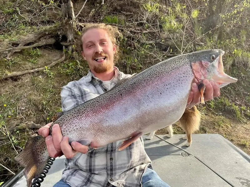 Angler holding a large fish