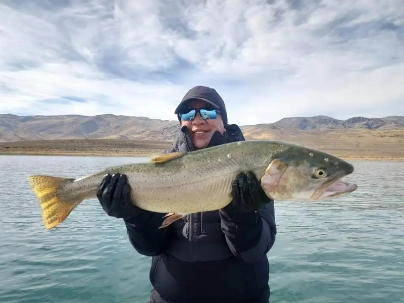Angler holding a large fish