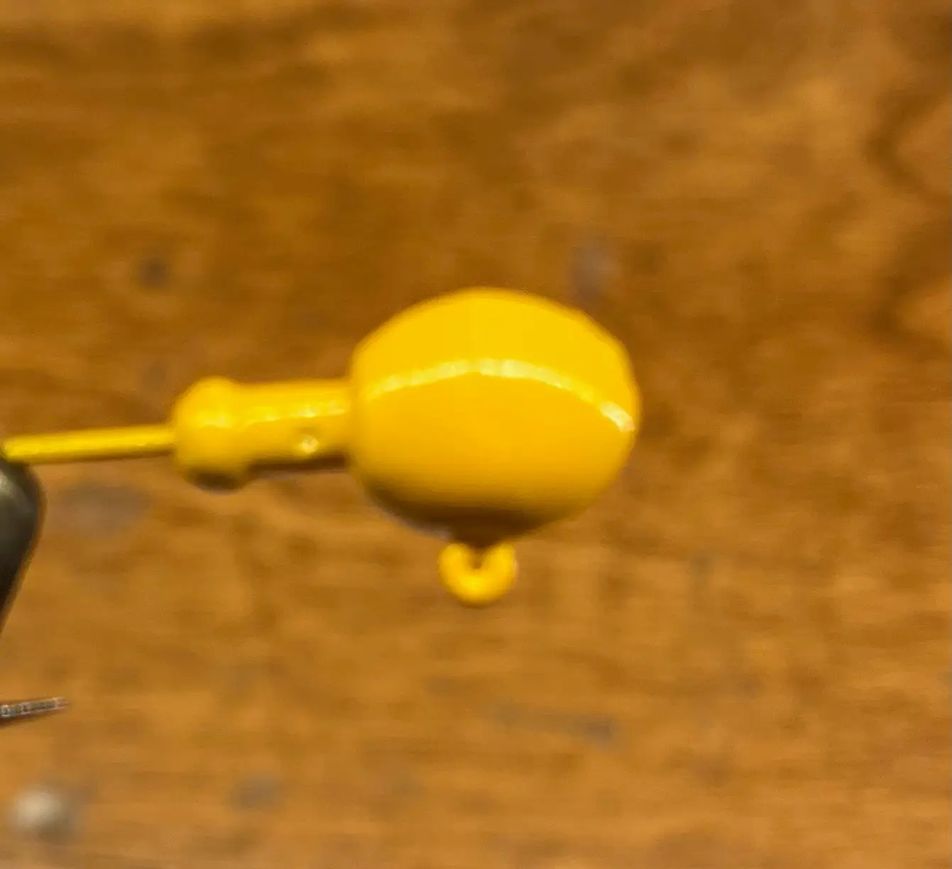 Image of a yellow fishing lure