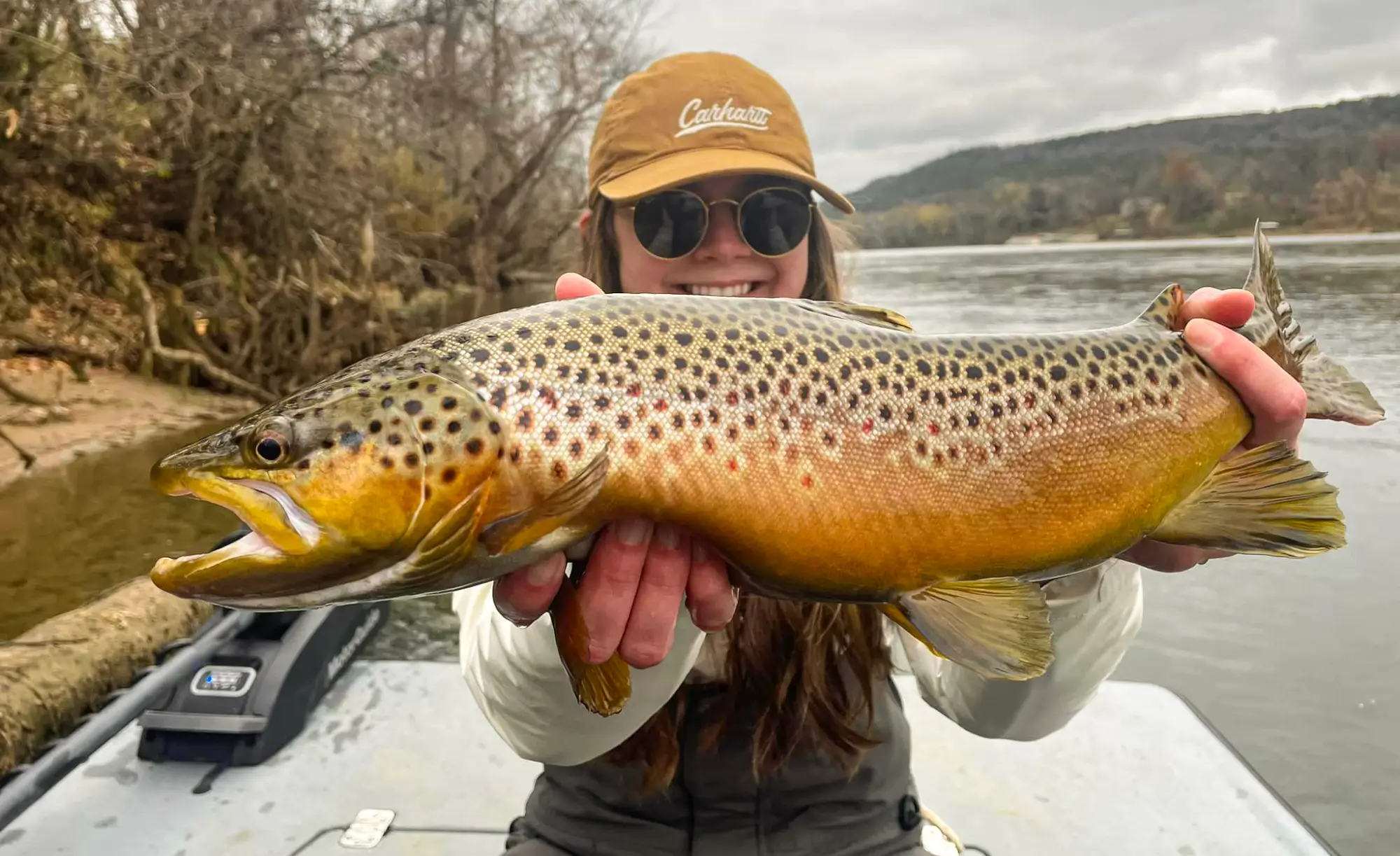 Woman Holding a large trout